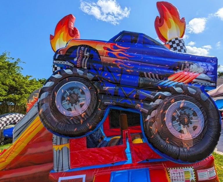 Monster Truck Bounce House Combo set up outdoors