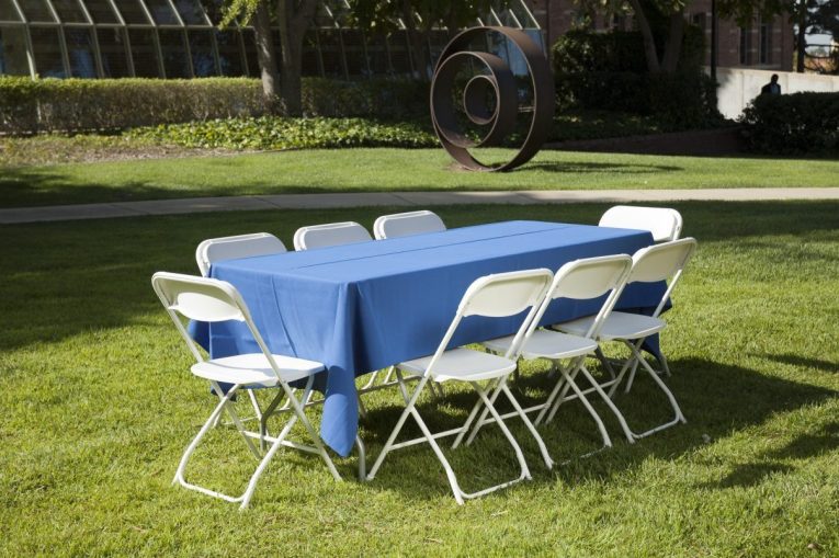 6ft-Rectangular-Tables-with-chairs-and-tablecloth-e1546835073543-1.jpg
