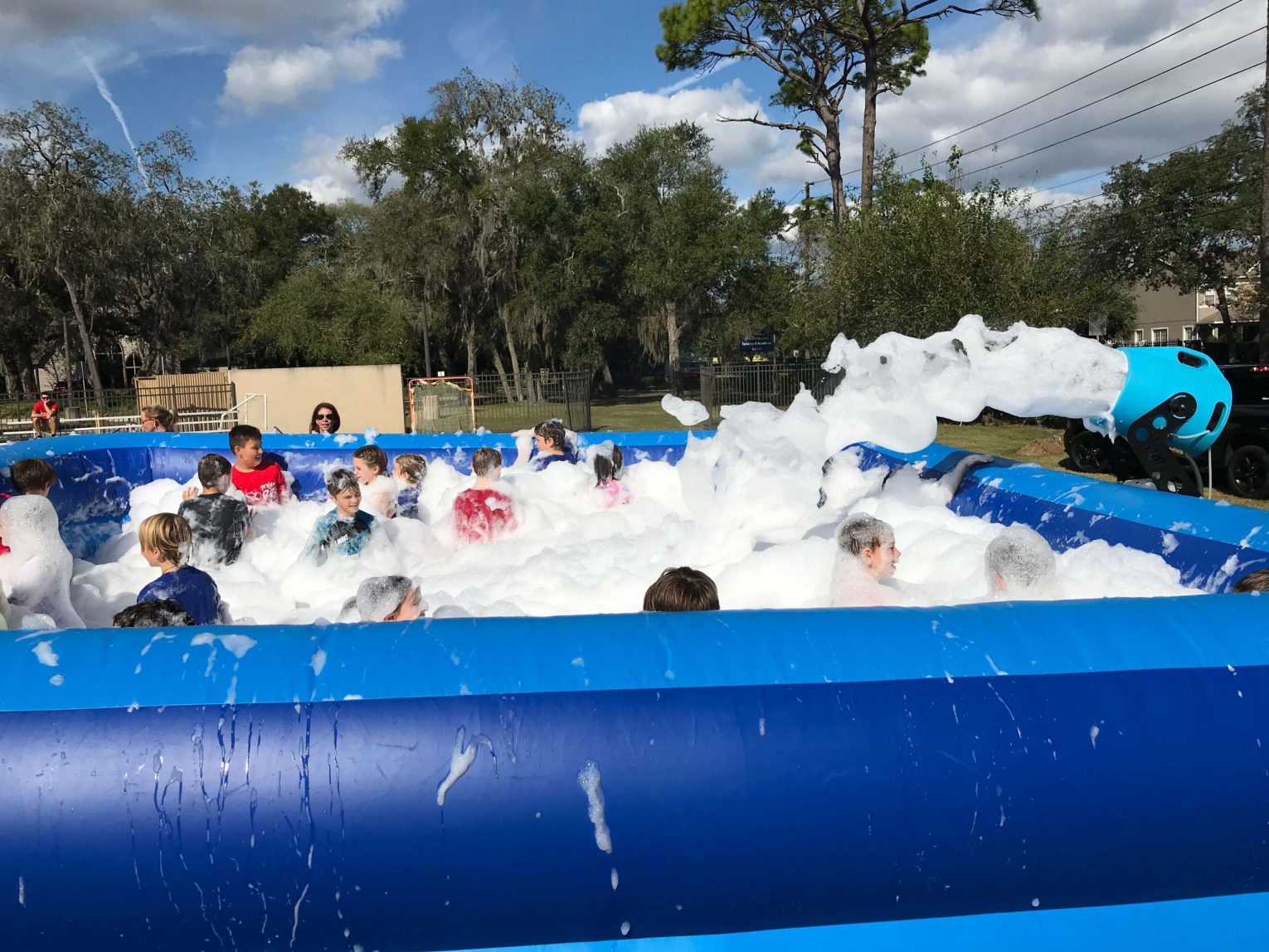 Guests enjoying an outdoor foam party